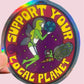 Holographic sticker with a character holding the Earth and text 'Support Your Local Planet' on a pink background.