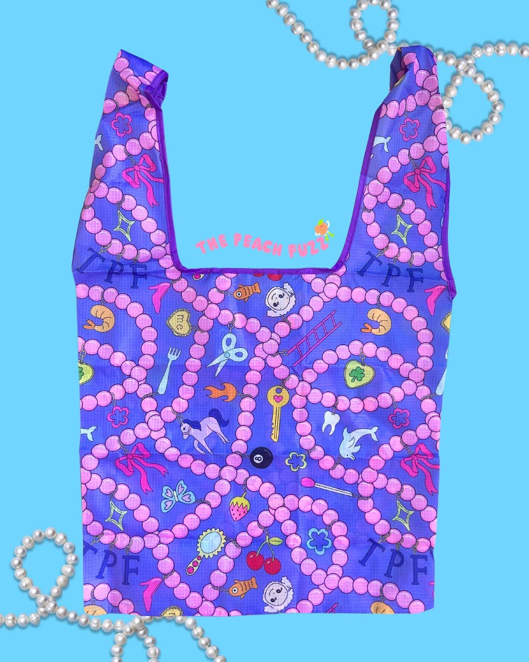 Reusable bag with colorful patterns and text on a blue background
