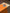 Orange background with a heart-shaped sticker featuring two sylvanian characters on a wooden surface.