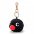 Black Pingu round keychain with a red nose and white eyes on a white background
