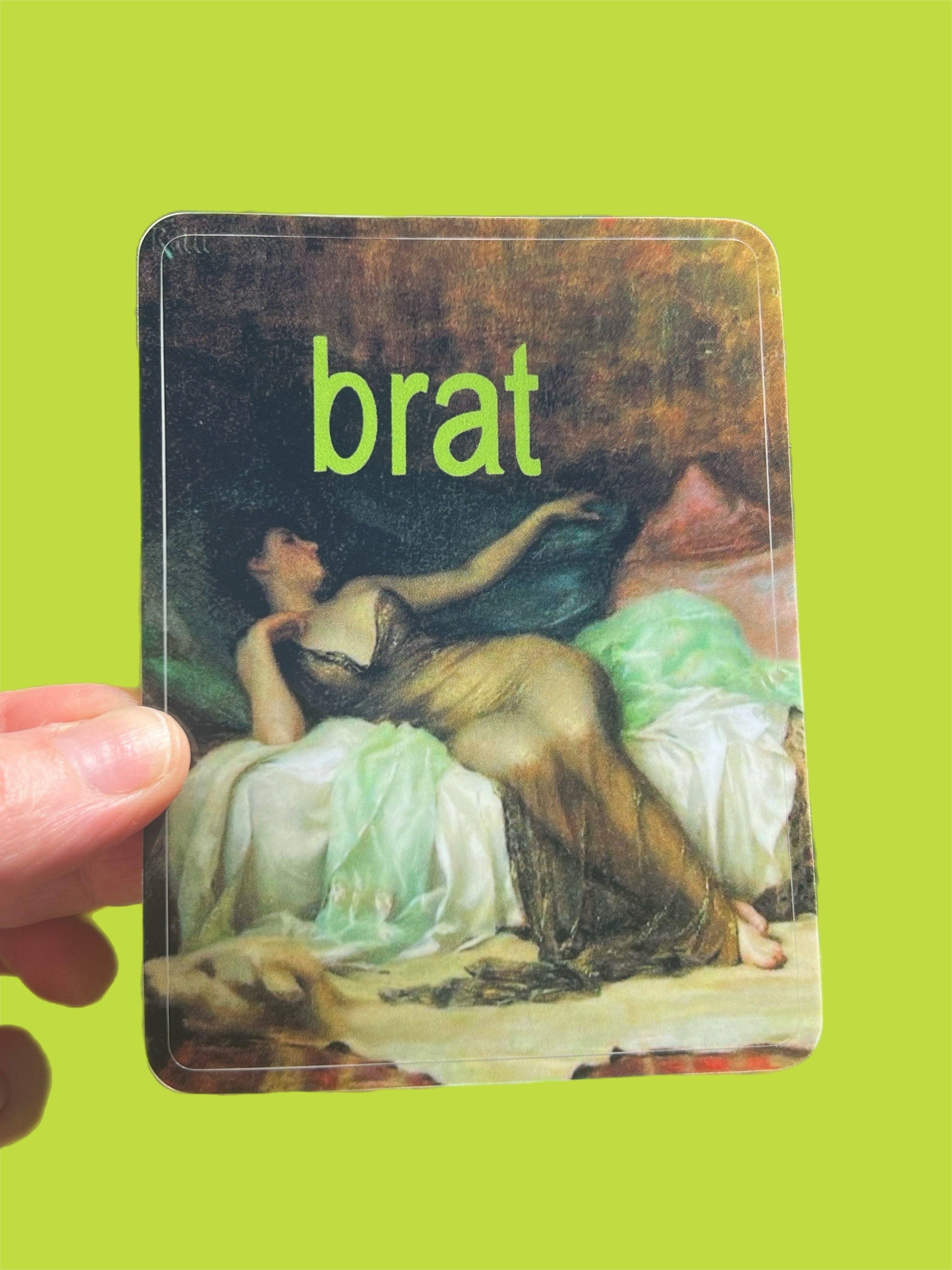 sticker with a classical painting and the word 'brat' on a green background