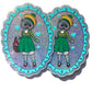 Two identical colorful illustrations of a cat character in a green dress with a blue border on a white background.