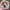 Cats are my friends sticker on a blurred background held by a hand