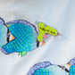 Colorful glue gun pin on a white background