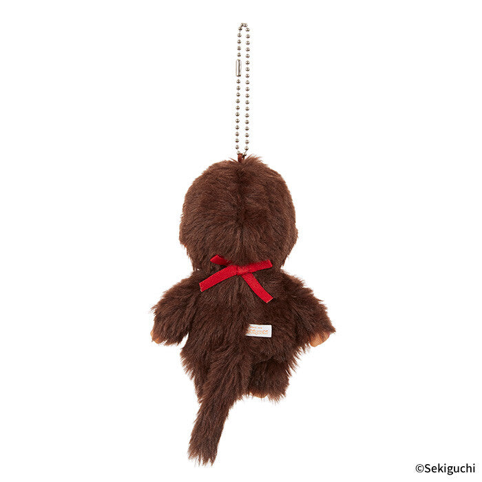 Brown plush keychain with a red bow on a white background