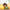 Monchhichi  surrounded by fruits and vegetables with a blurred natural background