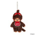 Brown plush Monchhichi keychain with a red bow and visible brand logo on a white background