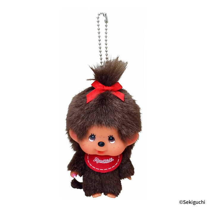 Plush keychain of Monchhichi with a red bow and shirt on a white background