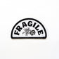Fragile label patch with black text and white background