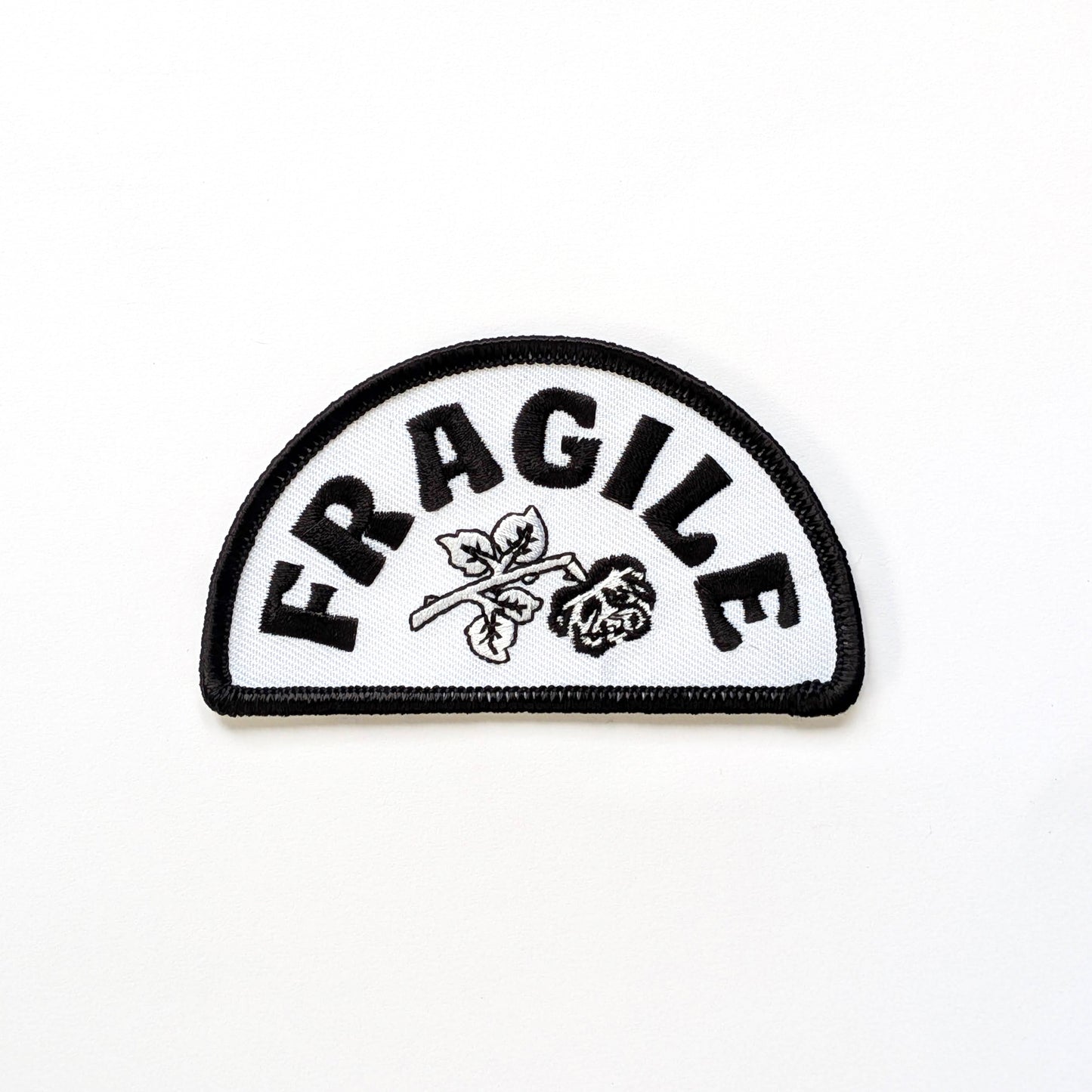 Fragile label patch with black text and white background