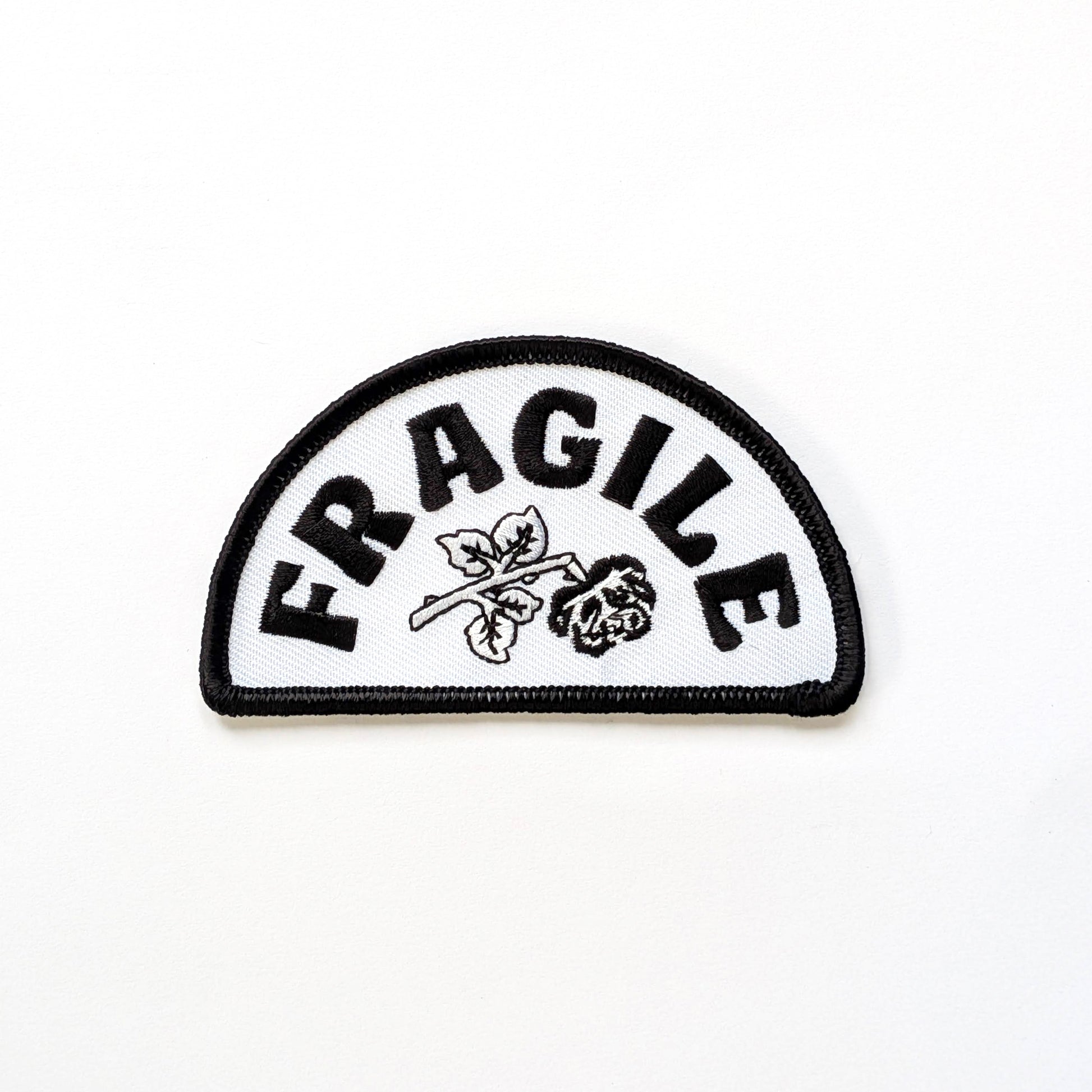 Fragile label patch with black text and white background