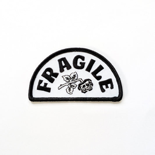 Fragile label patch with black text and white background
