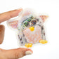 Hand holding a furby sticker