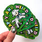 Stack of colorful stickers with a cartoon sheep and text on a white background