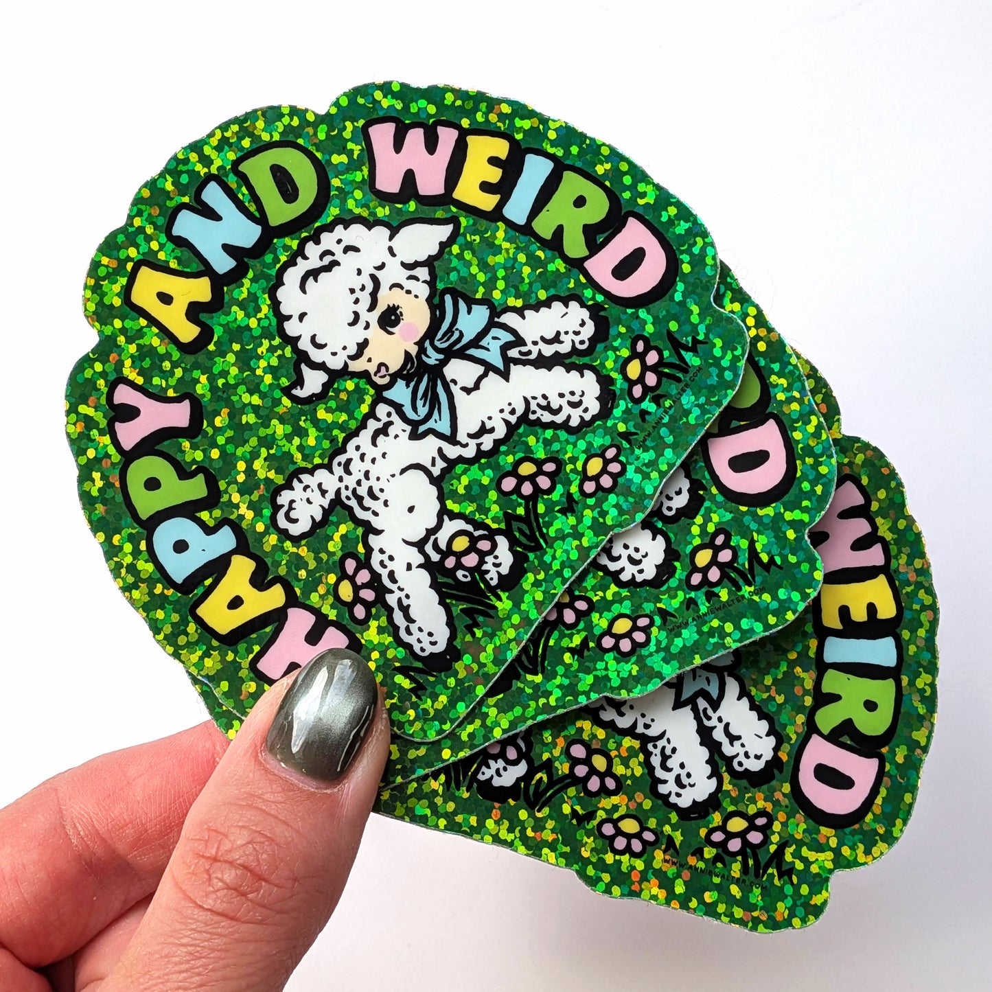 Stack of colorful stickers with a cartoon sheep and text on a white background
