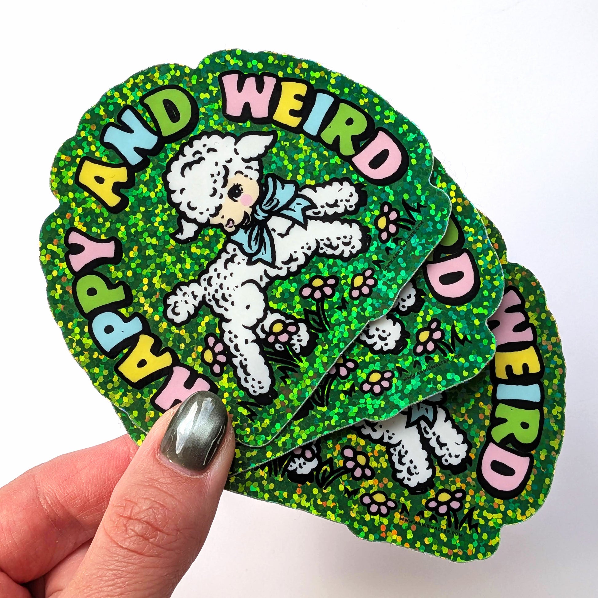 Stack of colorful stickers with a cartoon sheep and text on a white background