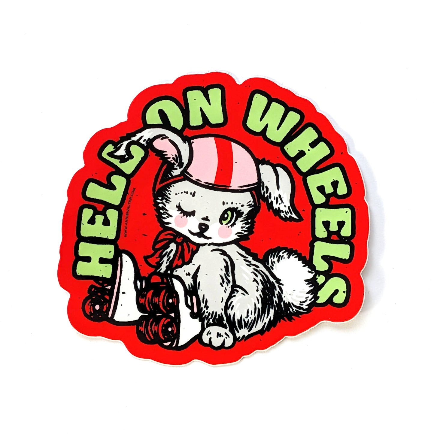 Sticker with a bunny on roller skates and 'Hello on Wheels' text.