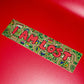 A rectangular sticker with a colorful cartoon map design and the words 'I AM LOST' in large red letters, placed diagonally on a solid red background.