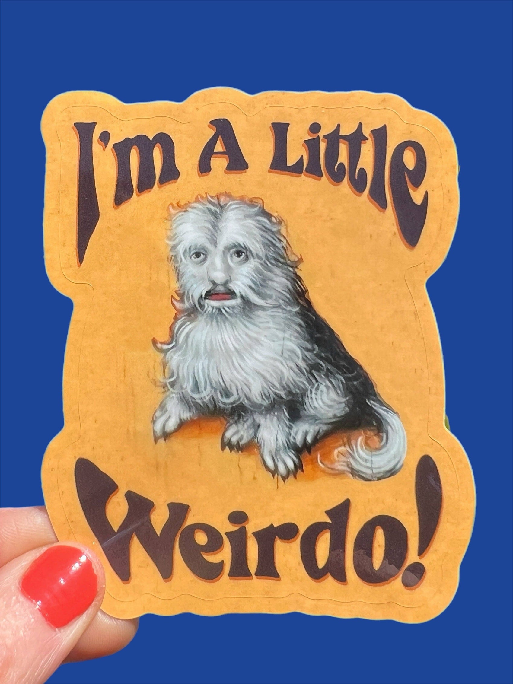Sticker with a dog illustration and text 'I'm A Little Weirdo!' on an orange background.
