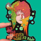 Colorful sticker with a stylized face and text 'It's only forever not long at all' held by a hand against a green background.
