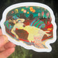 Colorful sticker of a woman lounging on a chair with a vibrant background held by a hand.