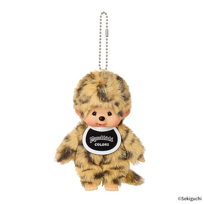 Monchhichi plush keychain in a leopard print outfit with a white shirt displaying 'Monchhichi Colors'.