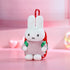 Miffy backpack tote bag on a pink background