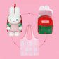 pink background with miffy backpack plush keychain