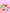 Colorful bread clips on a pink background with star decorations