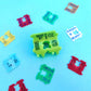 Colorful plastic labels on a blue background