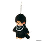 Black Monchhichi plush keychain with a white bib on a white background