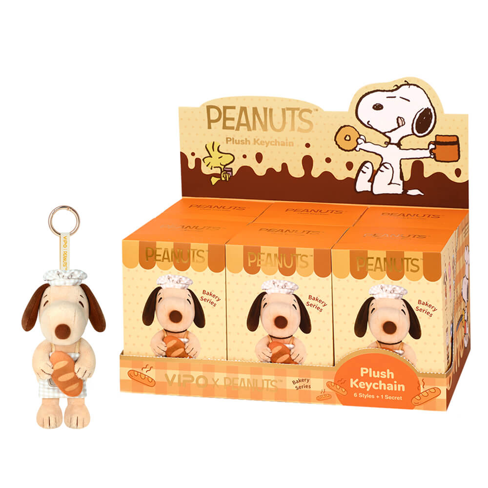 Peanuts plush keychain with packaging on a white background