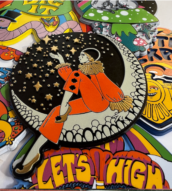 Colorful illustration of a person in a red coat with stars, surrounded by various shapes and text on a multicolored background.