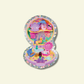 Colorful polly pocket on a light beige background
