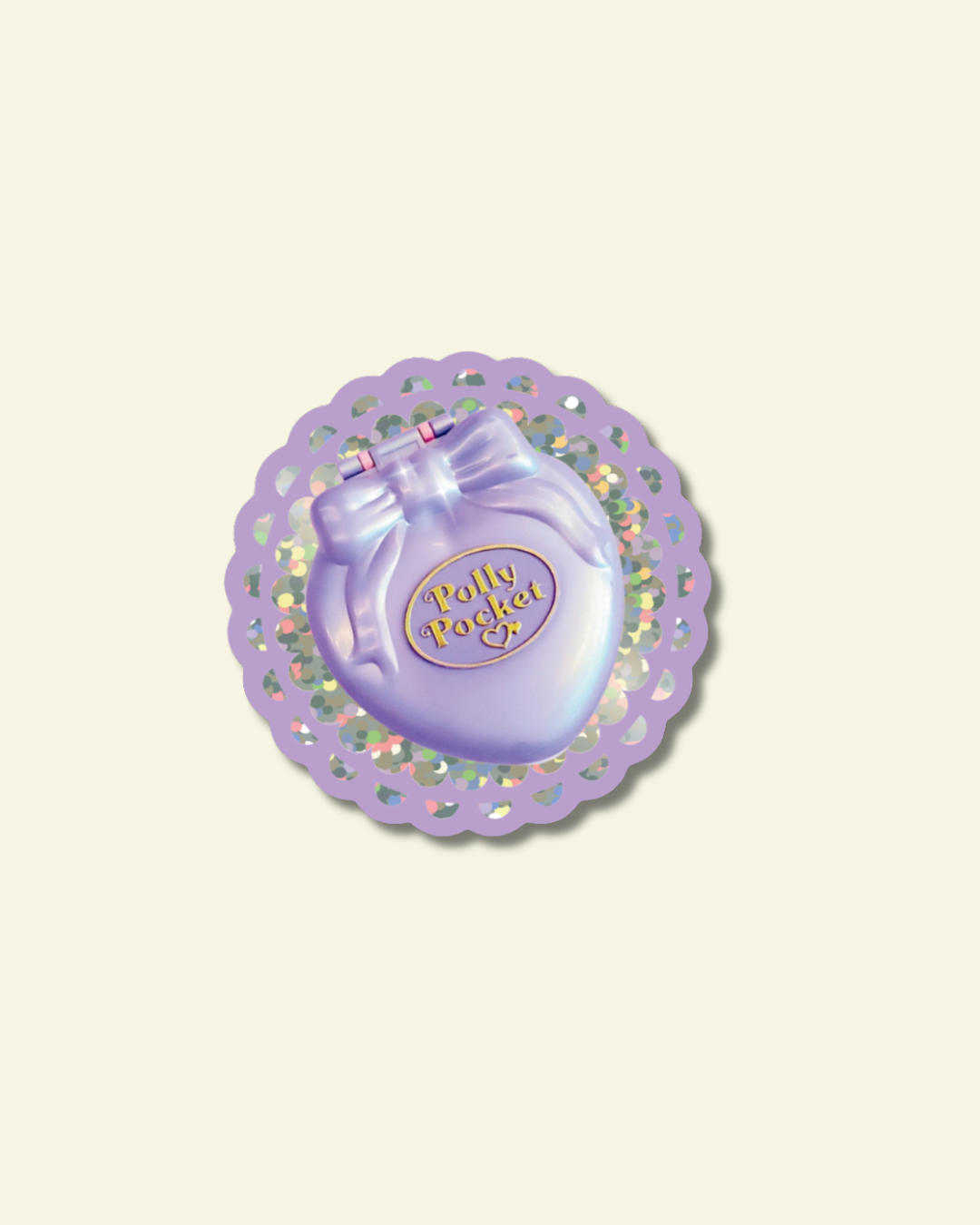 Purple Polly Pocket toy sticker on a decorative purple and glitter circular base with a light beige background