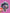 Holographic cat sticker with witch hat held by a hand on a pink background