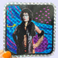 Holographic sticker with a person in a glamorous outfit against a colorful background