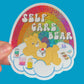 Sticker with a bear character and 'Self Care Bear' text on a blue background
