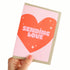 Card with a red heart and &