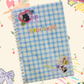 Checkered stickerbook on a colorful background