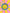 Hand holding a colorful smiley face sticker against a multicolored background