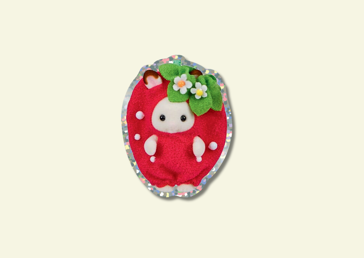 Rabbit sylvanian in a strawberry red background on a beige background