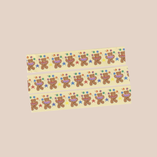 Washi tape with teddy bear pattern on a beige background