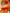 A collection of colorful stickers displayed on a wooden tabletop. The stickers feature various designs including a glittery cat, a red graphic with the text 'THE WINNER TAKES IT ALL', a pink oval sticker reading 'Thinking about my dog.