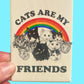 Magnet with cats and rainbow design on a blue background