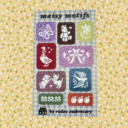 Packaging of 'maisy motifs' by rodeo embroidery on a floral background