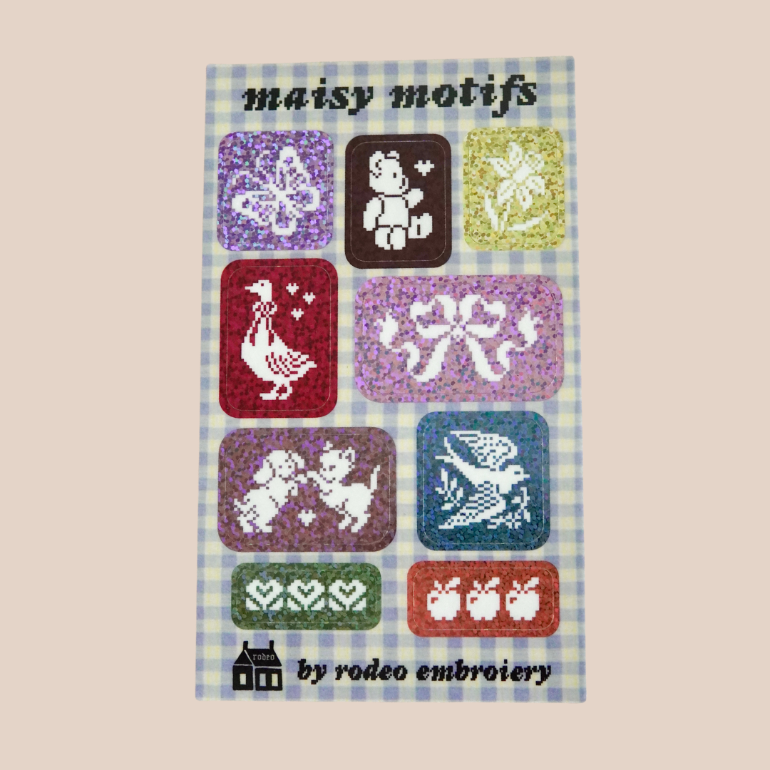 sticker sheet 'maisy motifs' by rodeo embroidery with colorful designs on a checkered background.