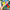 Colorful sticker with 'OVERSTIMULATED' text held by a hand in front of a colorful background