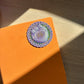 Polly pocket sticker on an orange background