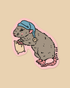 A die-cut sticker featuring a cute cartoon rat wearing a blue nightcap and holding a small cream pillow, set against a solid beige background.